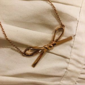 Kate Spade rose gold bow pendant necklace
